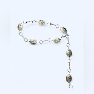 Silver tone belt with floral design accessories